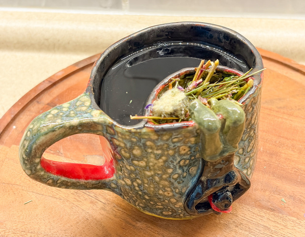 Break the Limit – Handcrafted Ceramic Tea Mug with Filter
