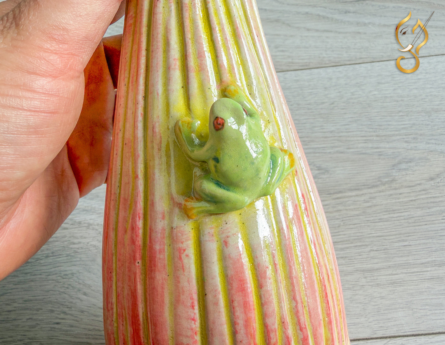 Frog On Orchid Flower
